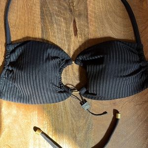 Never worn new vitamin a bikini top. Black ribbed fabric
